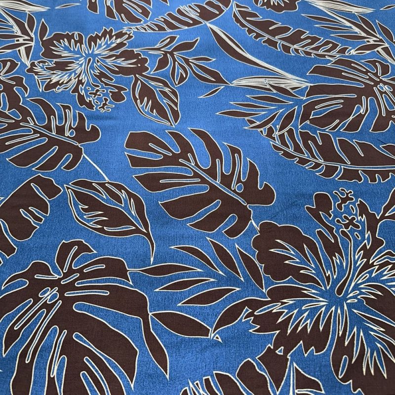 Tecido Viscose Estampada Folhagens Preto e Fundo Azul • Luema Tecidos