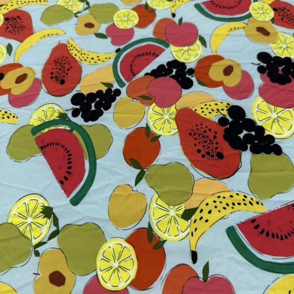 Tecido Malha Fluity Estampada Frutas Fundo Azul Claro • Luema Tecidos