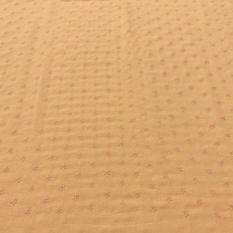 Tecido Linho Misto Bordado Florzinhas Laranja Claro • Luema Tecidos