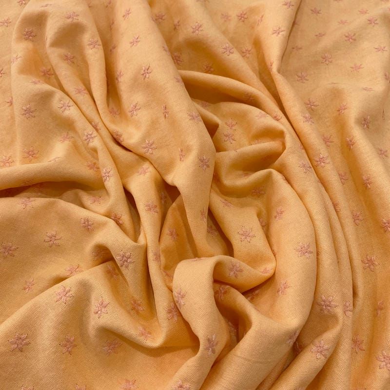 Tecido Linho Misto Bordado Florzinhas Laranja Claro • Luema Tecidos