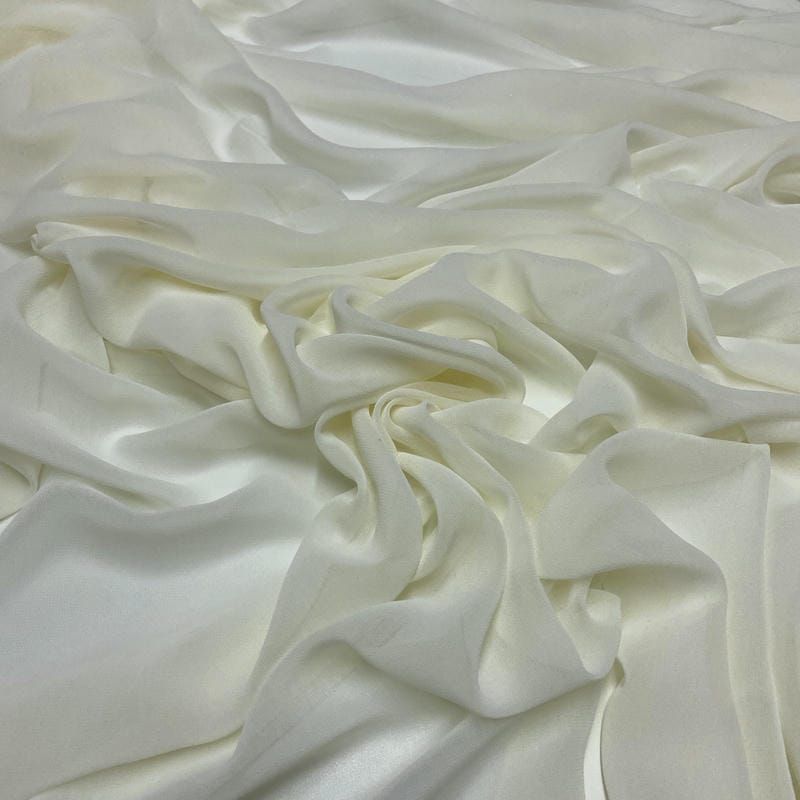 Tecido Musseline Liso Off White • Luema Tecidos