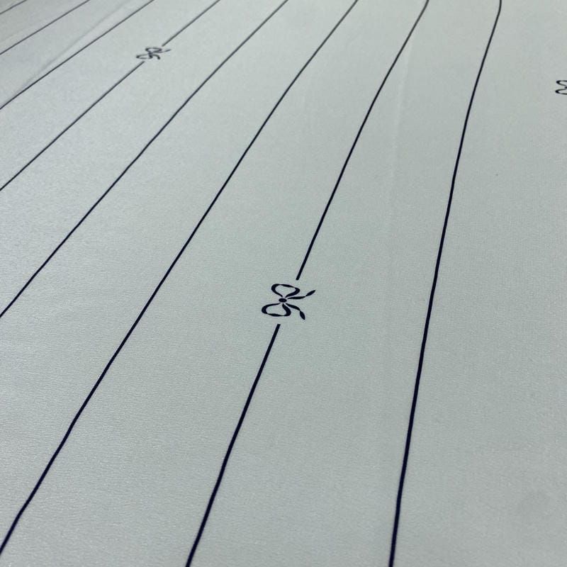 Tecido Crepe de Chine Seda Pura Lacinhos Off White • Luema Tecidos