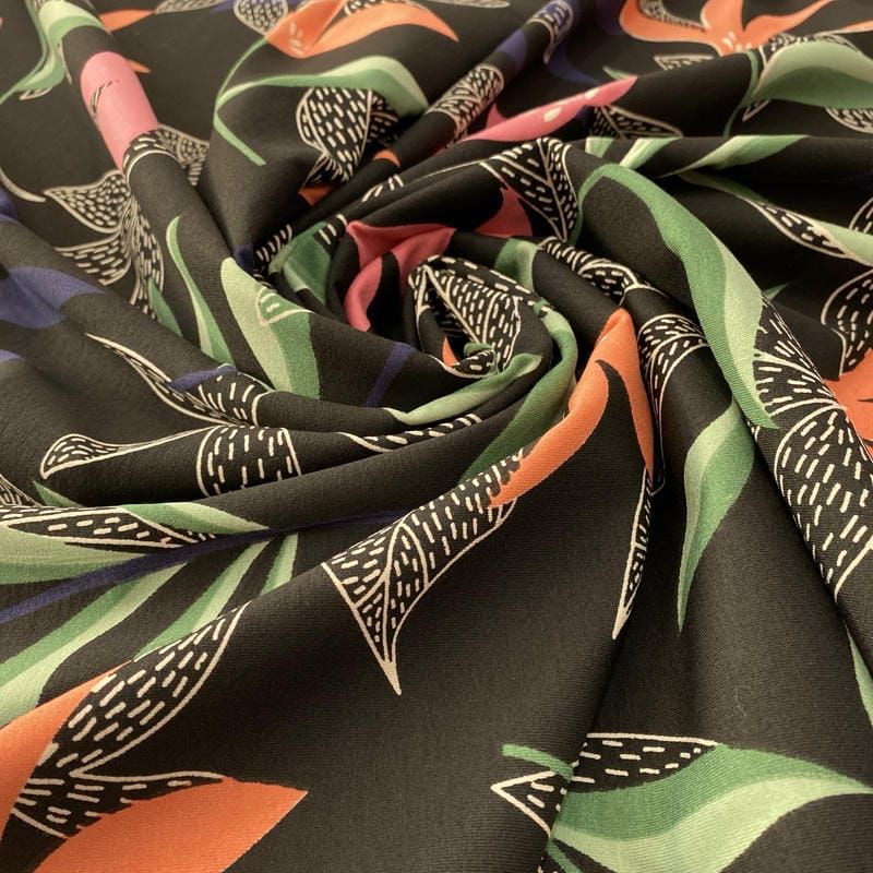 Tecido Viscolycra Estampada Colorido Fundo Preto • Luema Tecidos