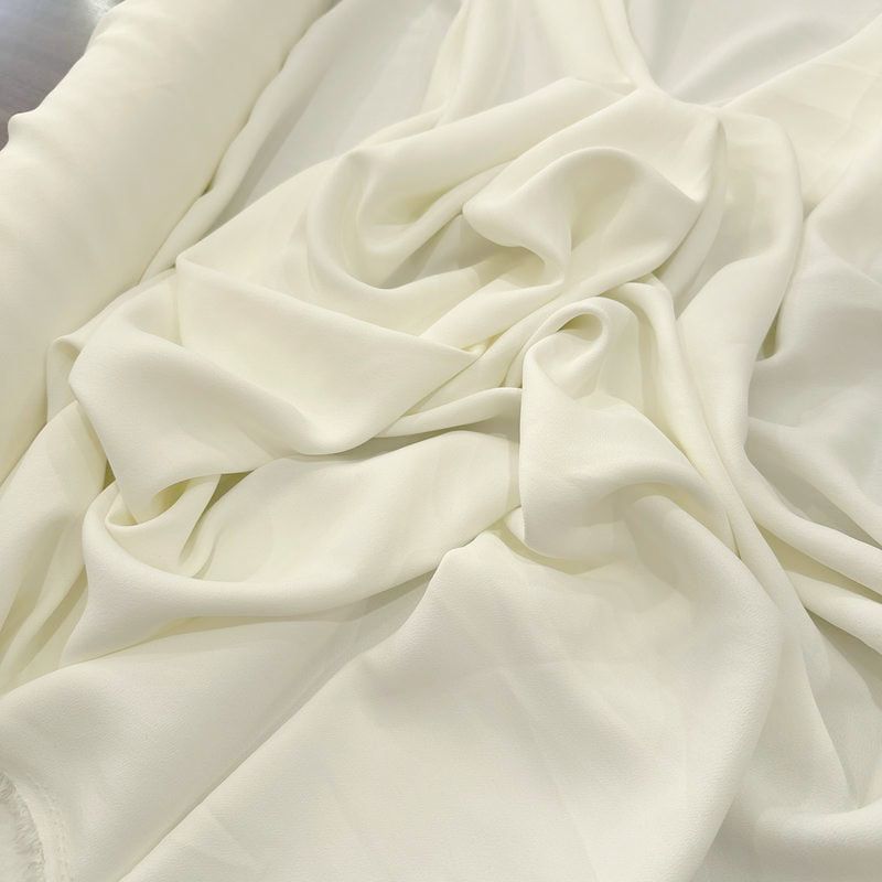 Tecido Crepe Patou Off White • Luema Tecidos Tecido Crepe Patou Off White • Luema Tecidos