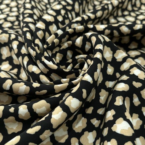 Tecido Viscose Estampada Animal Print Abstrata Fundo Preto • Luema Tecidos