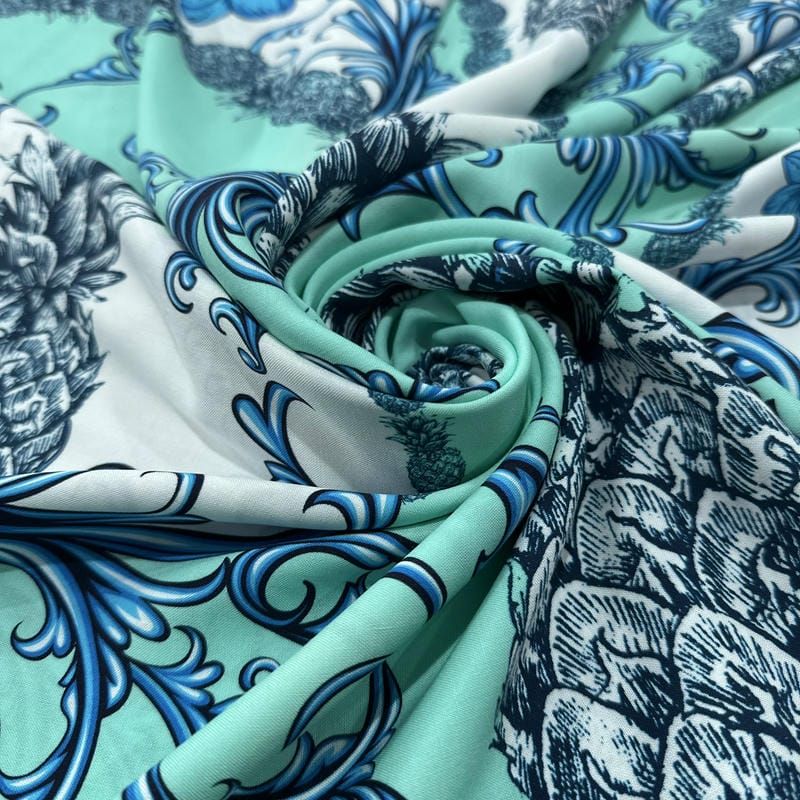 Tecido Viscose Estampada Abacaxi Arabesco Azul Fundo Verde Água • Luema Tecidos