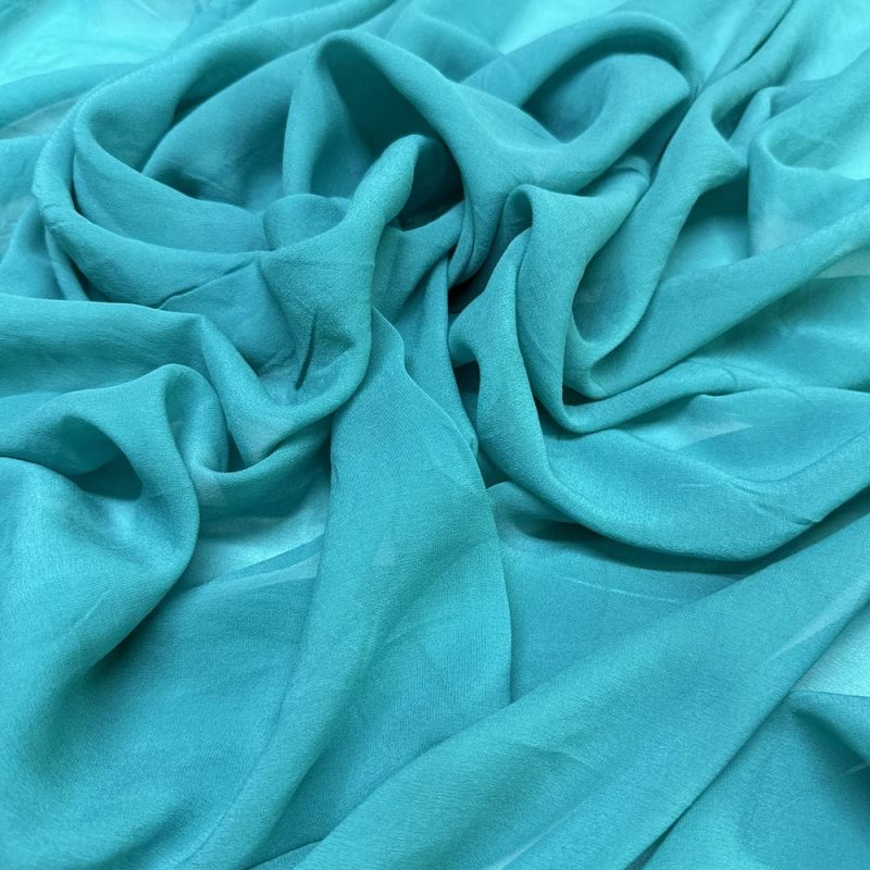 Tecido Musseline de Seda Verde Turquesa • Luema Tecidos Tecido Musseline de Seda Verde Turquesa • Luema Tecidos