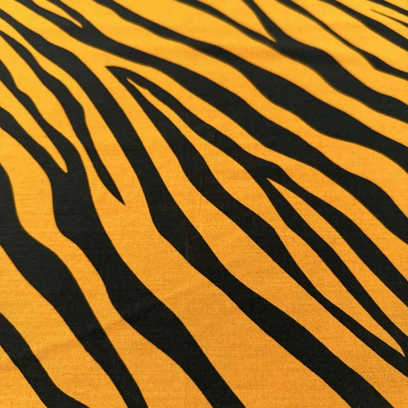 Tecido Viscose Estampada Zebra Fundo Marrom • Luema Tecidos Tecido Viscose Estampada Zebra Fundo Marrom • Luema Tecidos